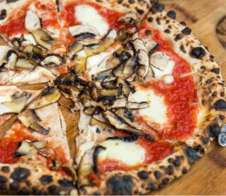 Close up of Kelowna pizza for Bless'd Sips & Slices